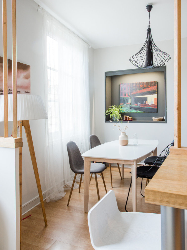Example of a danish dining room design in Montpellier