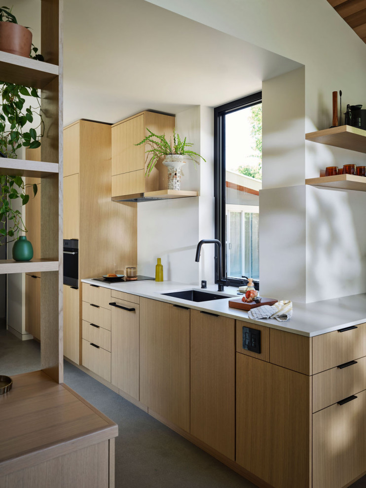 Modern ADU Kitchen with Rift-Cut Oak Cabinets and Vertical Marvin ...