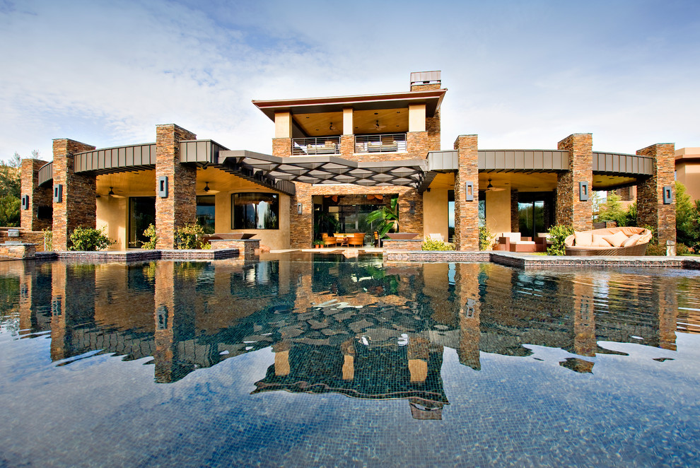 This is an example of a contemporary custom-shaped pool in Las Vegas.