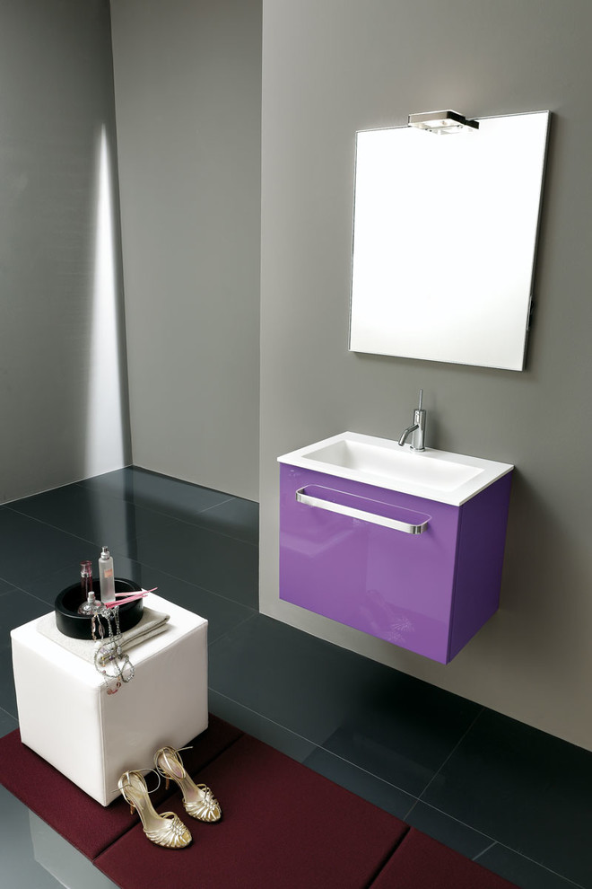 Photo of a mid-sized modern 3/4 bathroom in Miami with flat-panel cabinets, purple cabinets, grey walls, an integrated sink and black floor.