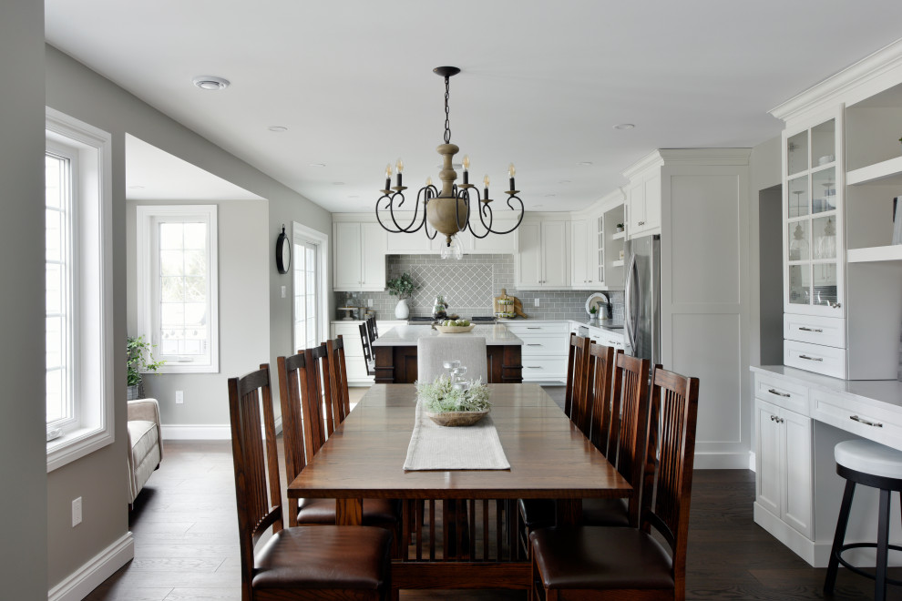 Design ideas for a large transitional kitchen/dining combo in Ottawa with dark hardwood floors and brown floor.