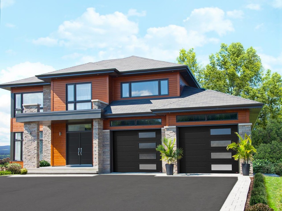 Inspiration for a mid-sized contemporary attached two-car garage in Cedar Rapids.