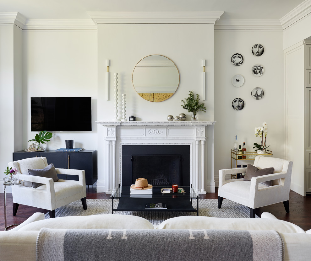 Inspiration for a transitional enclosed family room in Boston with white walls, dark hardwood floors, a standard fireplace and a wall-mounted tv.