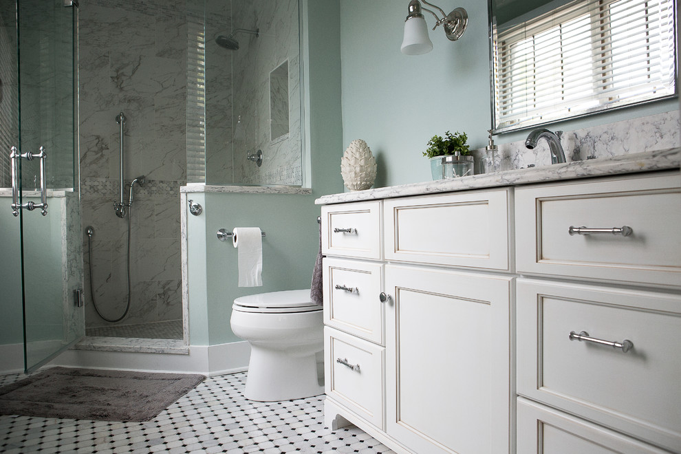 Small transitional master bathroom in Other with recessed-panel cabinets, white cabinets, an open shower, a two-piece toilet, gray tile, porcelain tile, blue walls, marble floors, an undermount sink and engineered quartz benchtops.