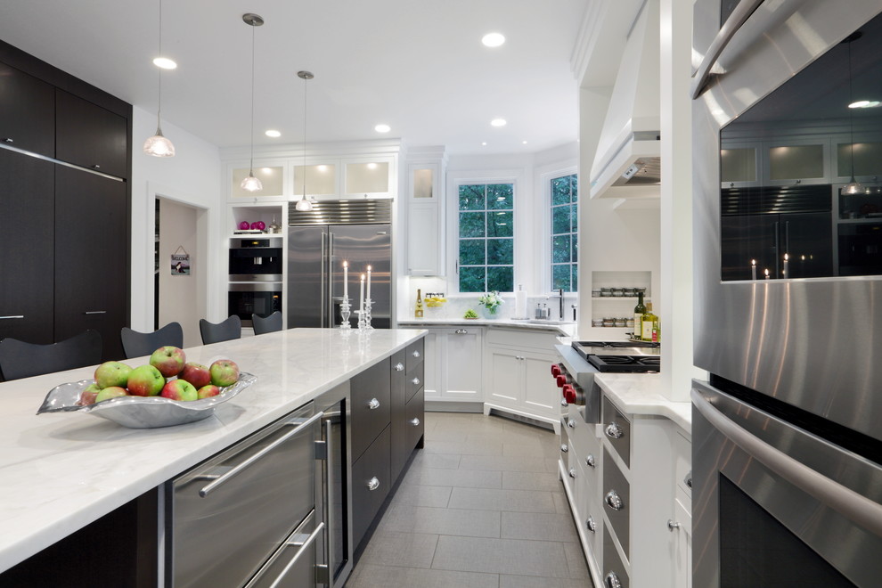 Photo of a transitional kitchen in Boston with stainless steel appliances.