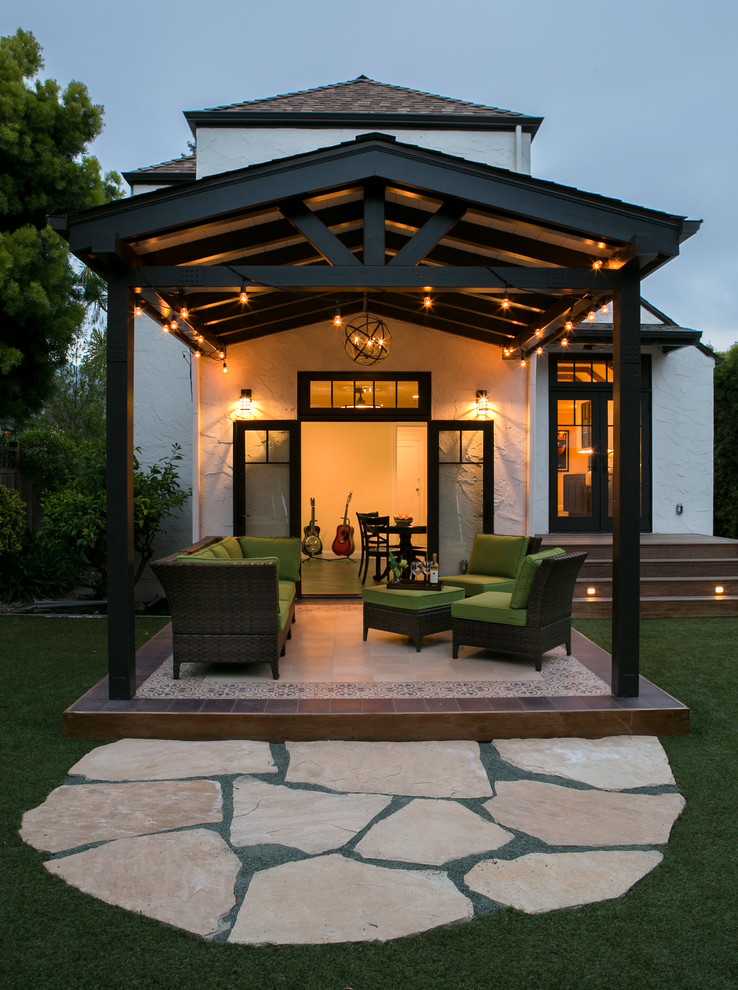 Inspiration for a mid-sized transitional backyard stone patio remodel in San Francisco