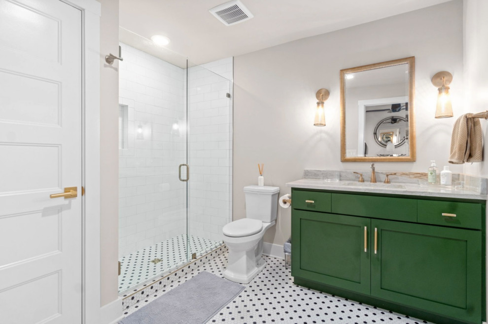 Bohemian shower room bathroom with shaker cabinets, green cabinets, an alcove shower, a two-piece toilet, white tiles, ceramic tiles, ceramic flooring, a submerged sink, solid surface worktops, white floors, a hinged door, grey worktops, a single sink and a built in vanity unit.