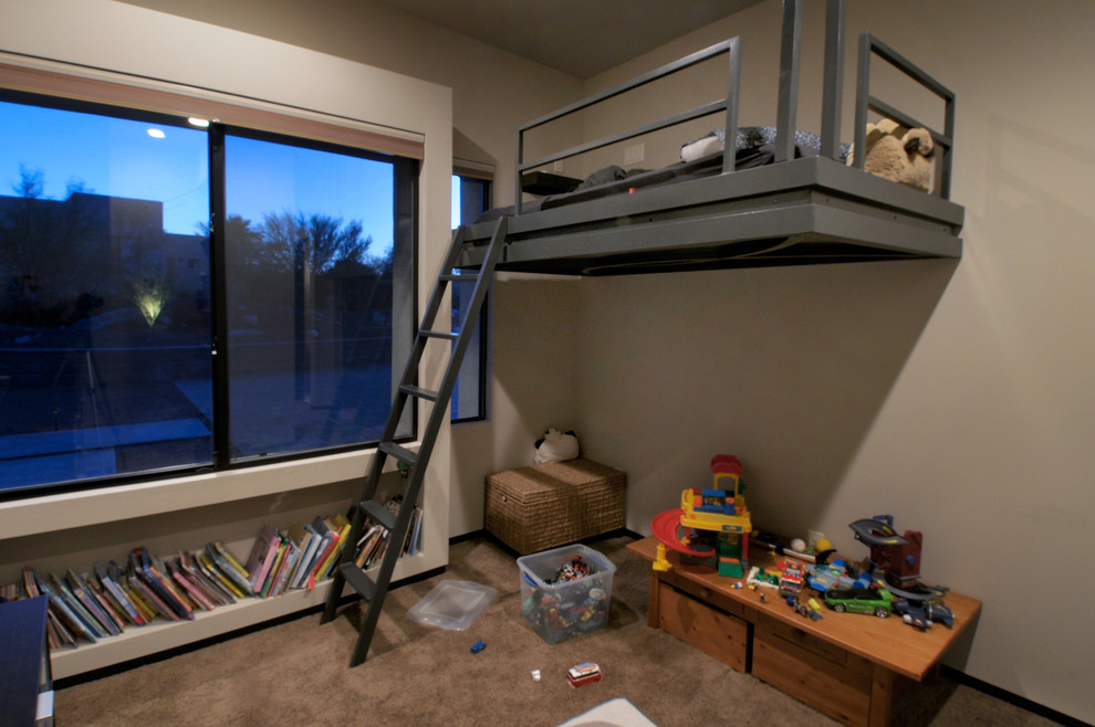 This is an example of a mid-sized kids' bedroom for kids 4-10 years old in Phoenix with brown walls, carpet and brown floor.
