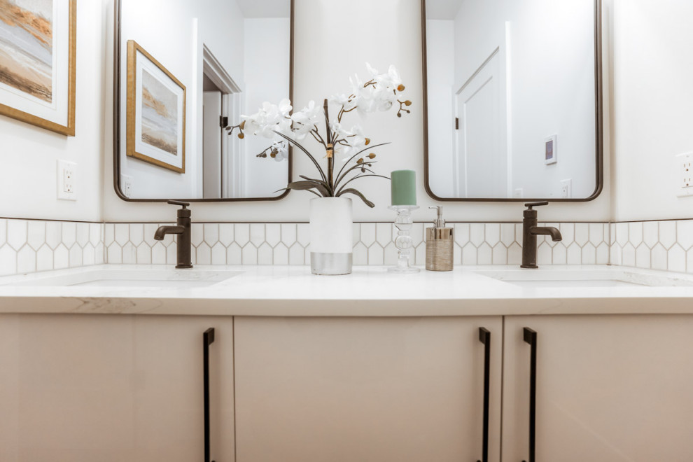 Inspiration for a mid-sized contemporary master bathroom in Seattle with flat-panel cabinets, white cabinets, white tile, an undermount sink, marble benchtops, white benchtops, a double vanity, a floating vanity and white walls.