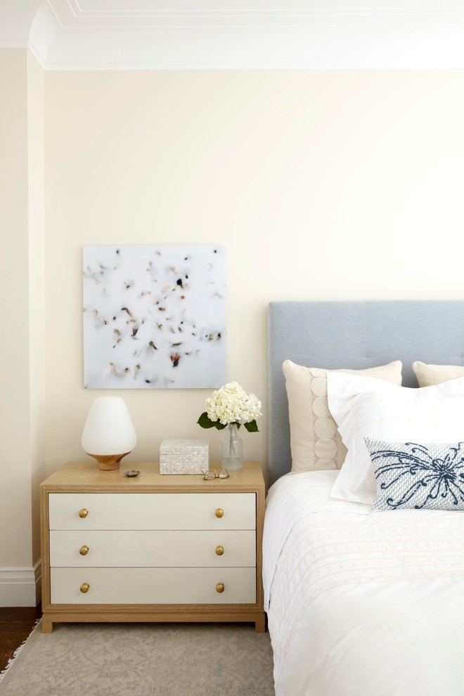 Design ideas for a transitional bedroom in New York with beige walls.