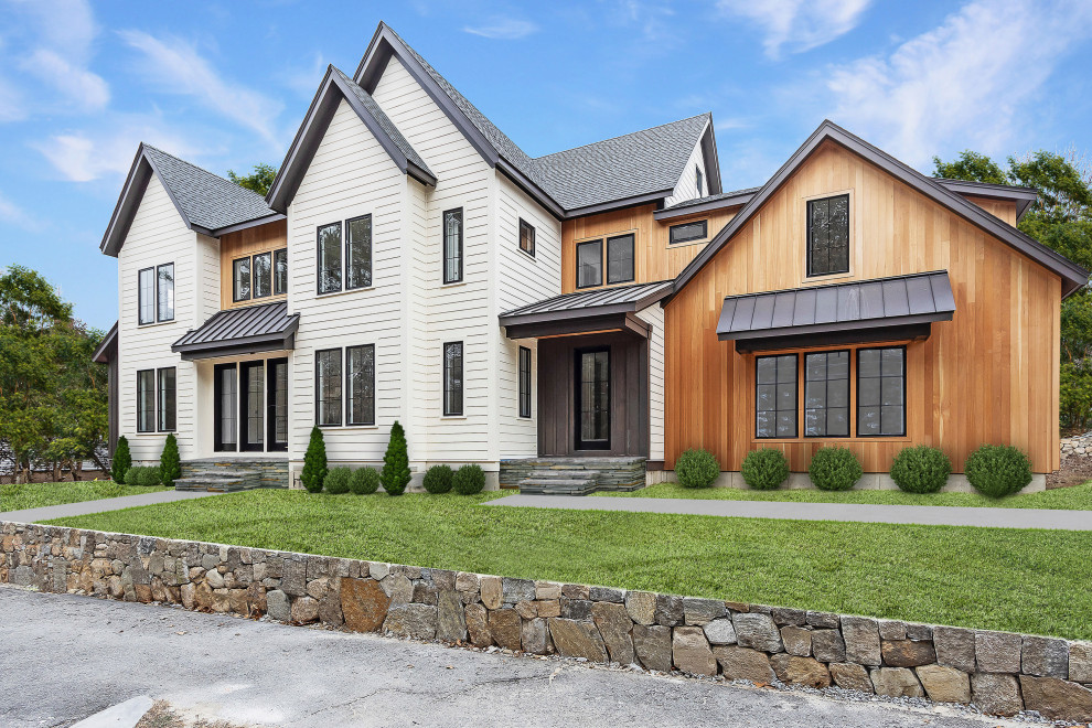 Example of a transitional home design design in Boston