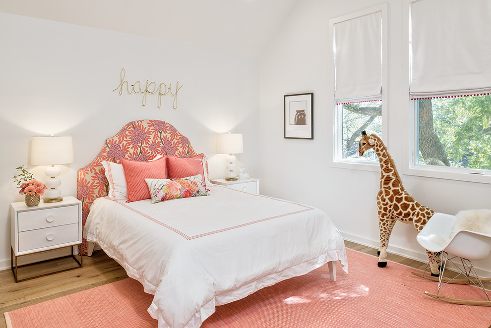 Design ideas for a transitional kids' room for girls in Austin with white walls, dark hardwood floors and brown floor.