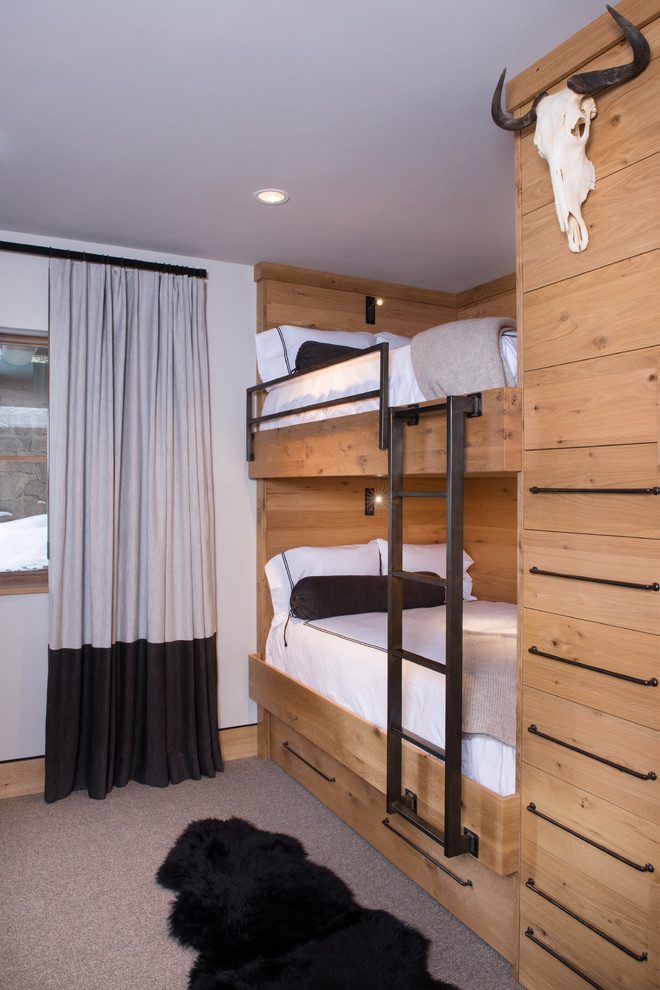 Vail Ski Haus - Kids' bedroom - bedroom and small rustic gender-neutral carpeted and gray floor kids' bedroom idea in Denver with white walls