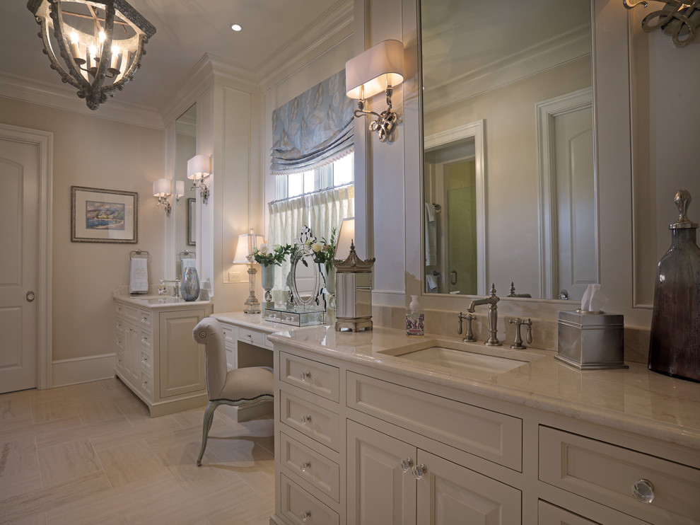 Large traditional master bathroom in Atlanta with raised-panel cabinets, white cabinets, a one-piece toilet, beige tile, beige walls, vinyl floors, an undermount sink and engineered quartz benchtops.