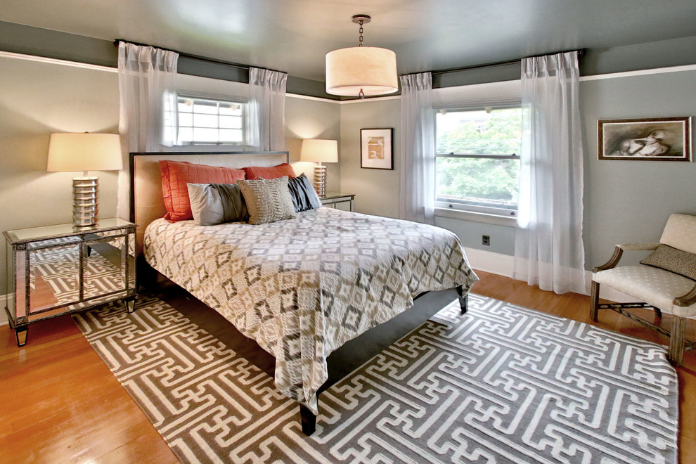 This is an example of a transitional bedroom in Portland.