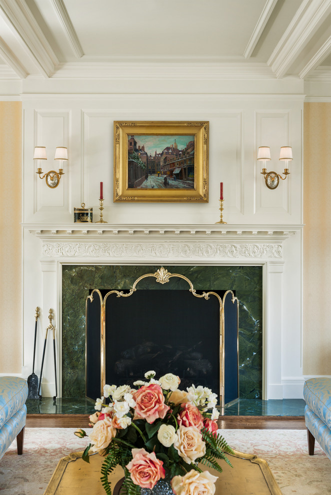 This is an example of a traditional formal living room in Philadelphia with medium hardwood floors, a standard fireplace and a stone fireplace surround.