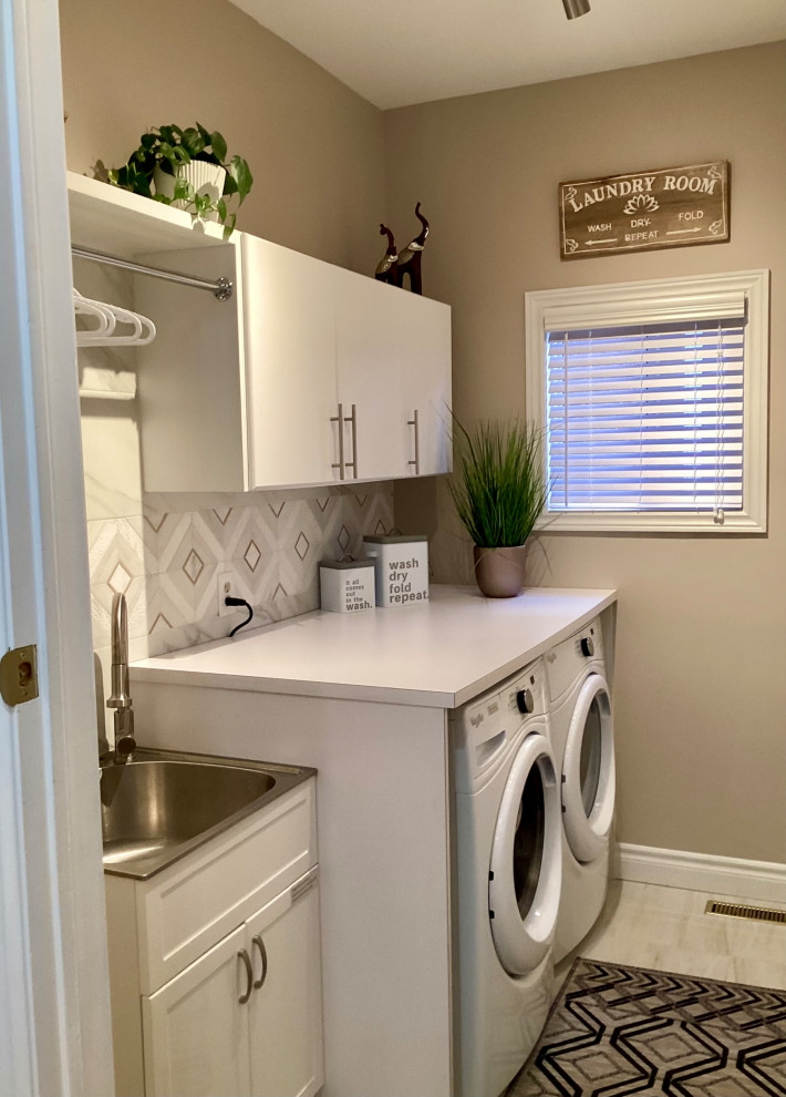 Inspiration for a transitional laundry room remodel in Toronto