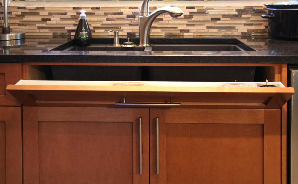 Inspiration for a mid-sized contemporary kitchen remodel with an undermount sink, shaker cabinets, medium tone wood cabinets, granite countertops and stainless steel appliances