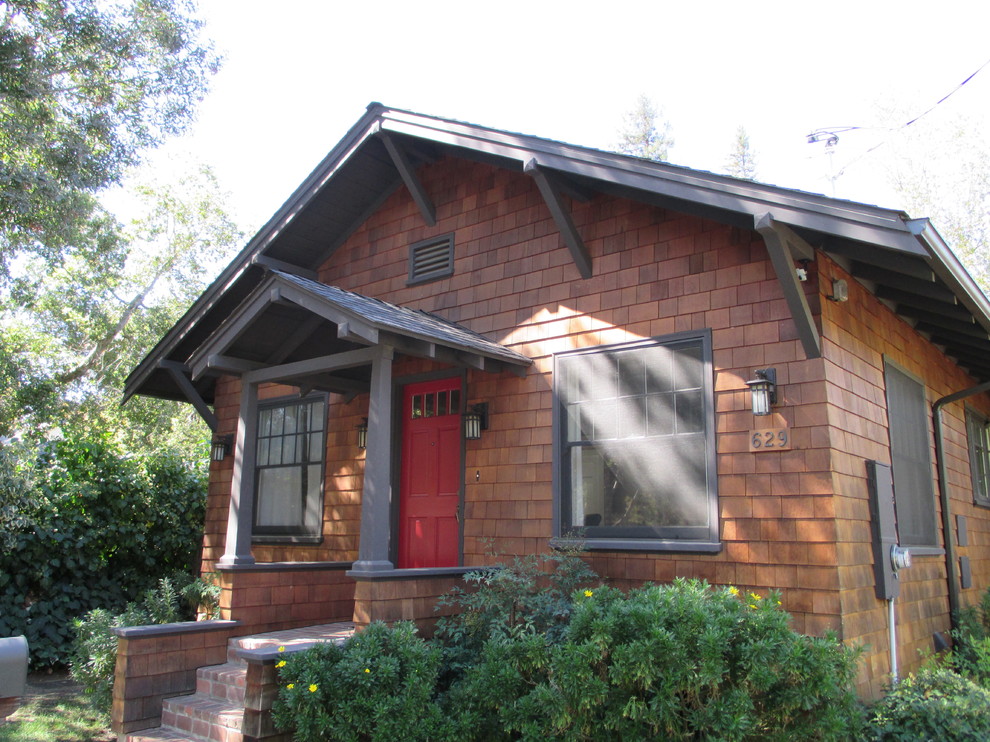 Inspiration for a mid-sized country one-storey brown exterior in San Francisco with wood siding and a gable roof.