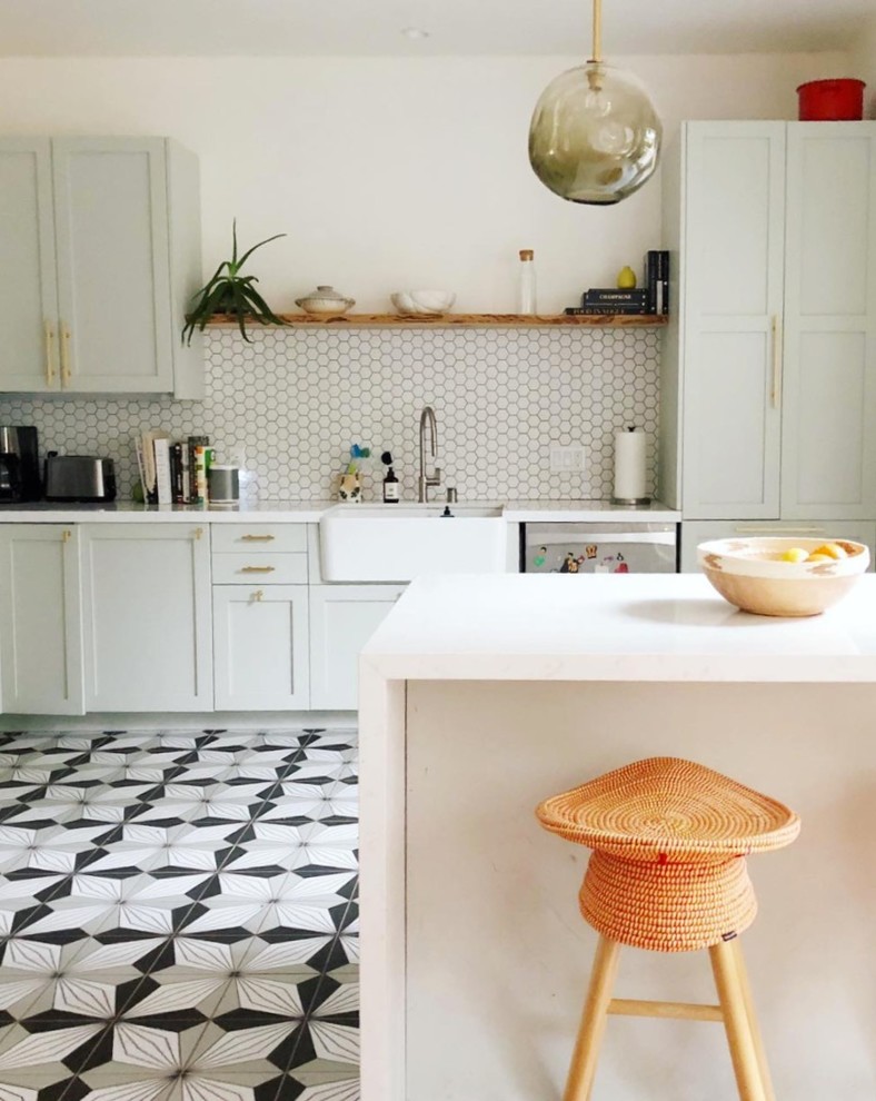 Photo of an eclectic kitchen in San Francisco with ceramic floors and grey floor.