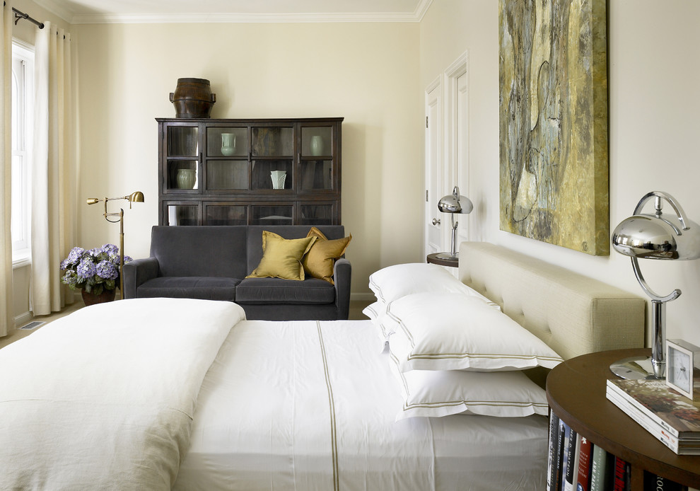 Inspiration for a transitional bedroom in Chicago with white walls.