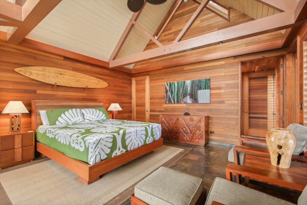 This is an example of a large tropical bedroom in Hawaii.