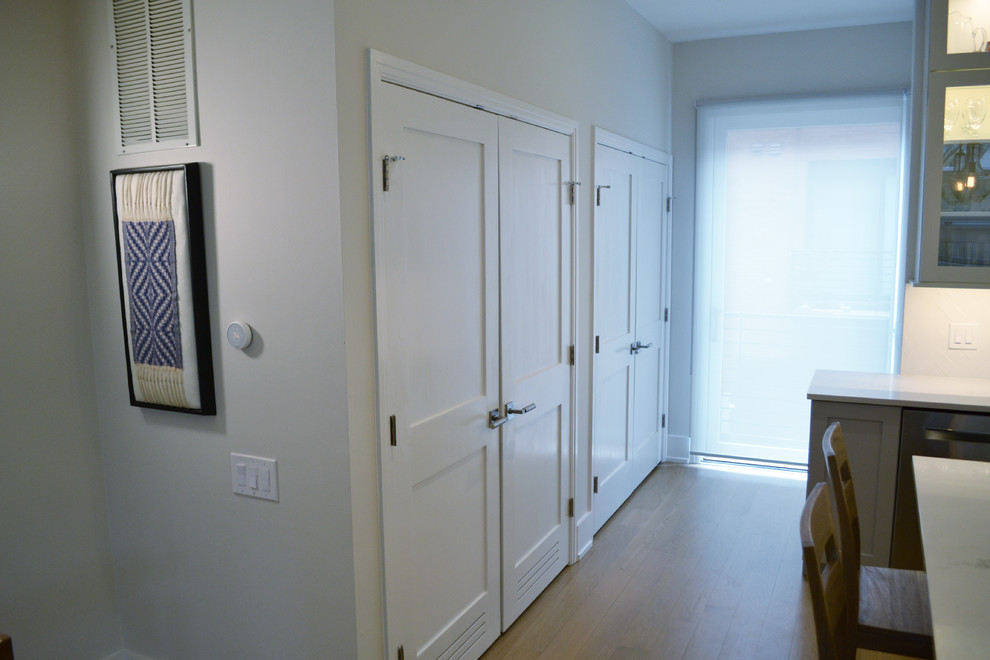 This is an example of an expansive transitional storage and wardrobe in Chicago.