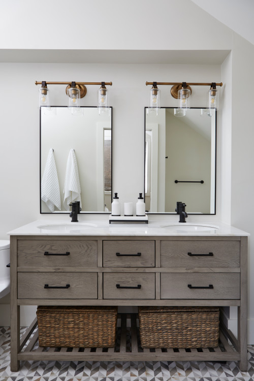 Country Charm: Antique Brass Wall Sconces and Chevron Floor Tiles