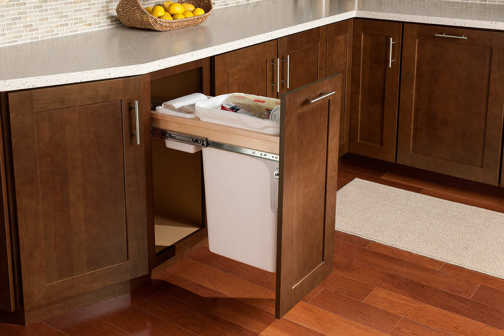 Example of a transitional kitchen design in DC Metro with shaker cabinets and medium tone wood cabinets