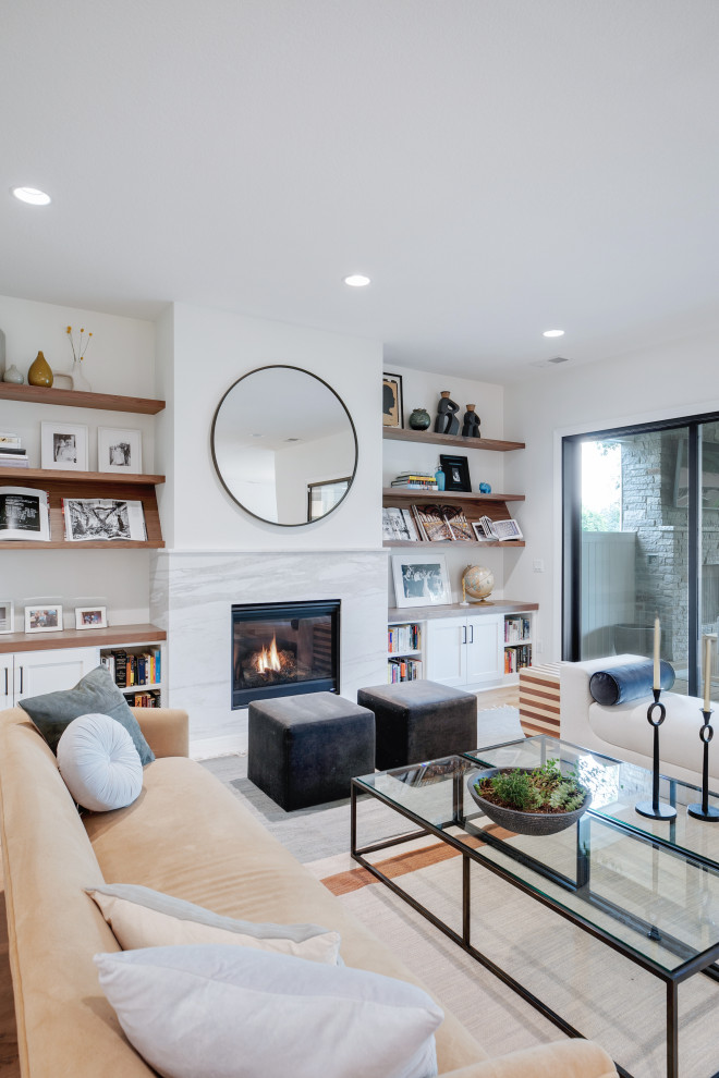 Design ideas for an expansive midcentury formal open concept living room in Portland with white walls, light hardwood floors, a standard fireplace, a stone fireplace surround, no tv and beige floor.