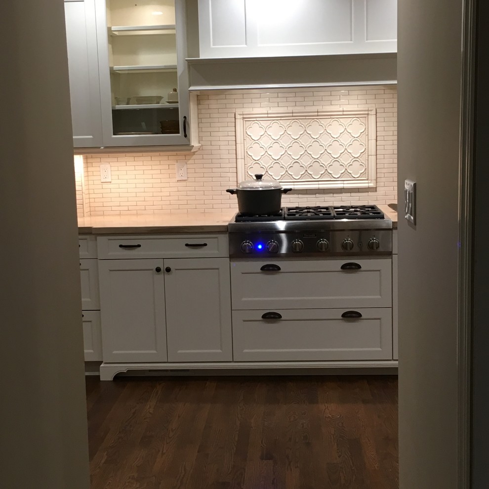 Example of a transitional kitchen design in New York