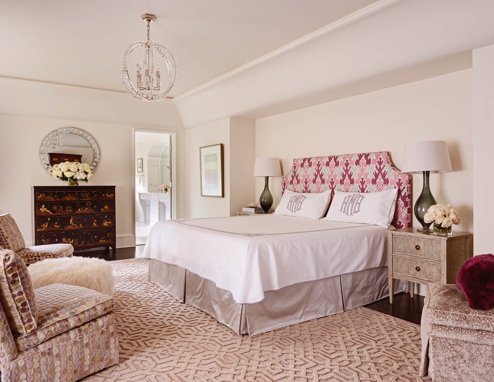 Large elegant master dark wood floor bedroom photo in Charlotte with beige walls