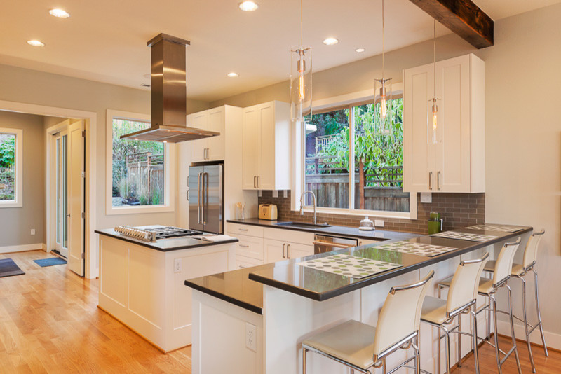 Example of a transitional kitchen design in Denver