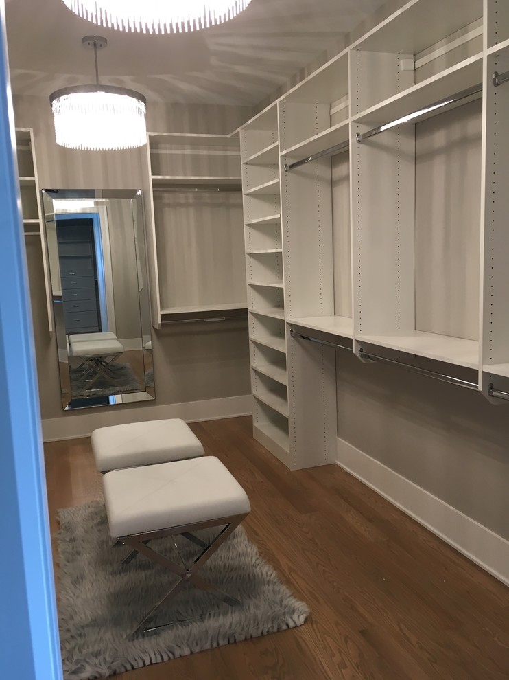 Inspiration for a large transitional women's light wood floor and beige floor home design remodel in Chicago with open cabinets and white cabinets