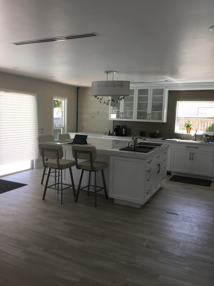 Example of a transitional kitchen design in Miami