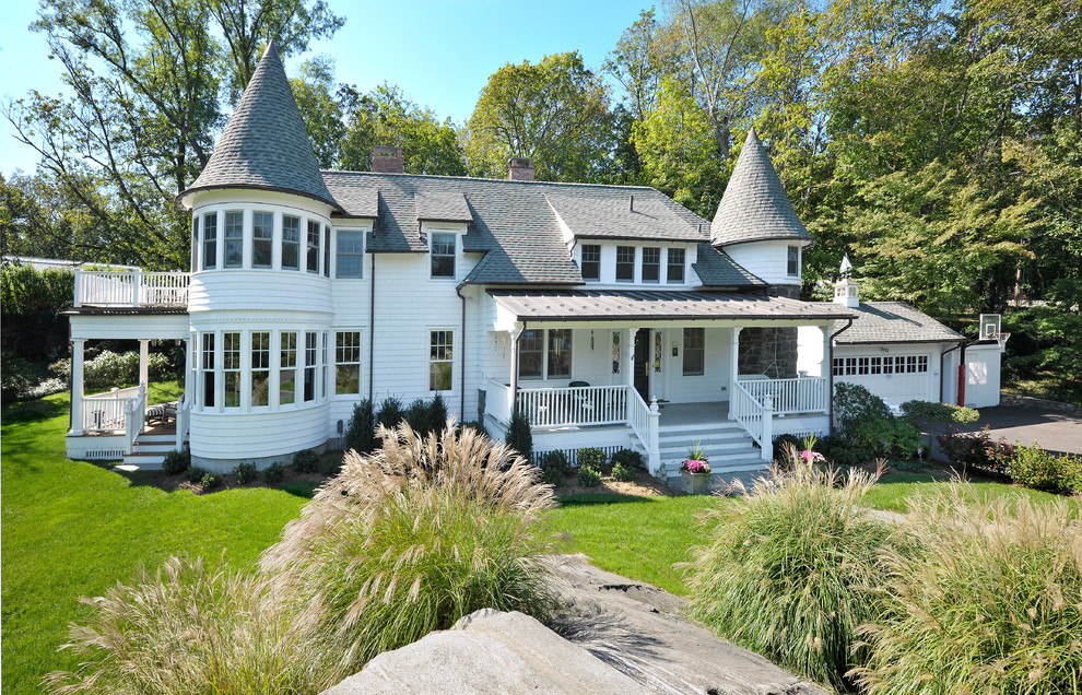 Design ideas for a traditional two-storey white exterior in New York.