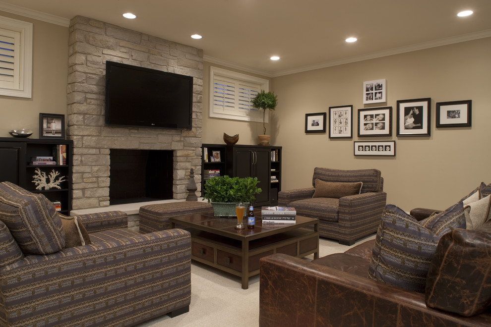 Inspiration for a contemporary enclosed family room in Chicago with beige walls, carpet, a standard fireplace, a stone fireplace surround and a wall-mounted tv.