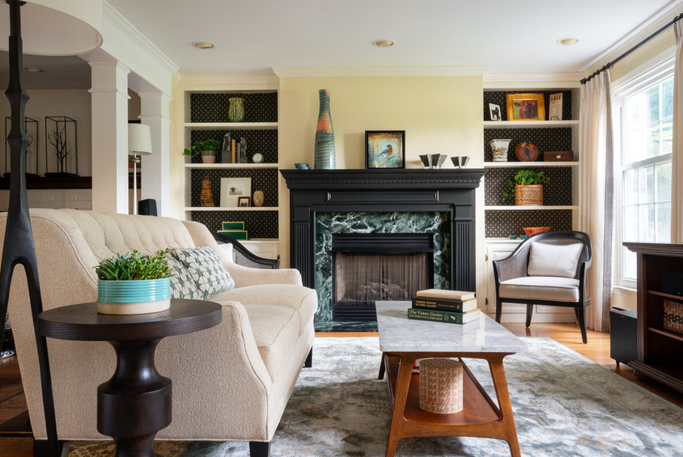Mid-sized transitional open concept light wood floor and green floor living room photo in Philadelphia with white walls, a standard fireplace, a stone fireplace and a wall-mounted tv