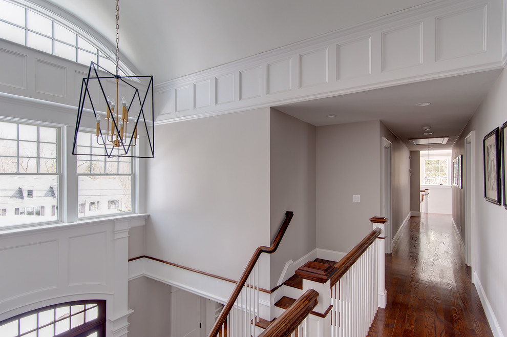 Design ideas for an expansive traditional hallway in Boston with grey walls and dark hardwood floors.