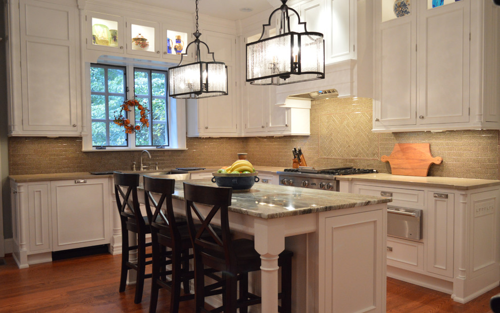 Inspiration for a mid-sized transitional medium tone wood floor kitchen remodel in Atlanta with an island, a farmhouse sink, glass tile backsplash and stainless steel appliances