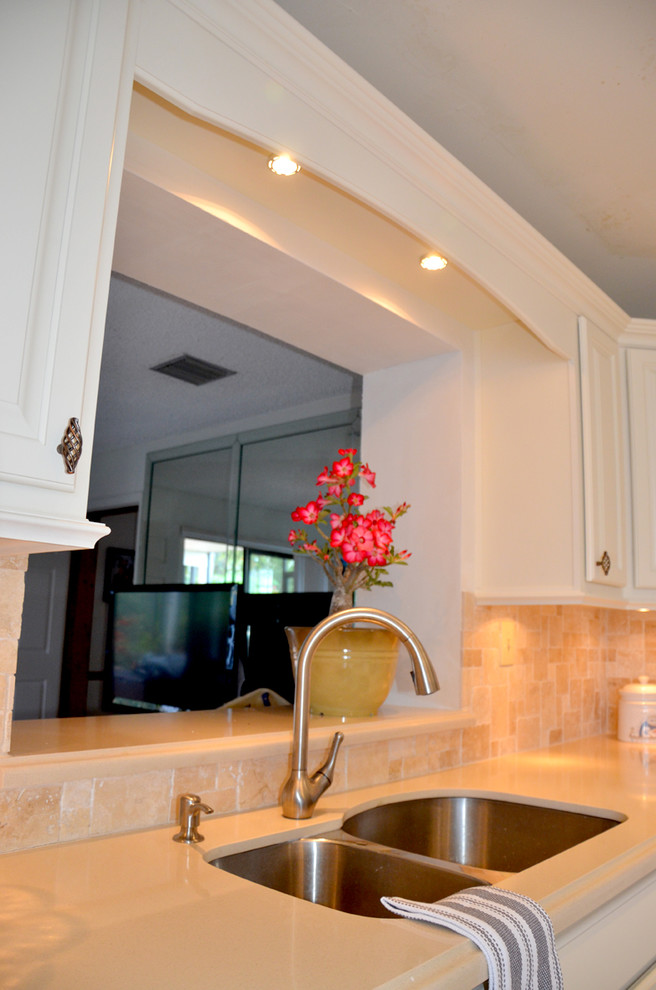 Example of a transitional kitchen design in Miami