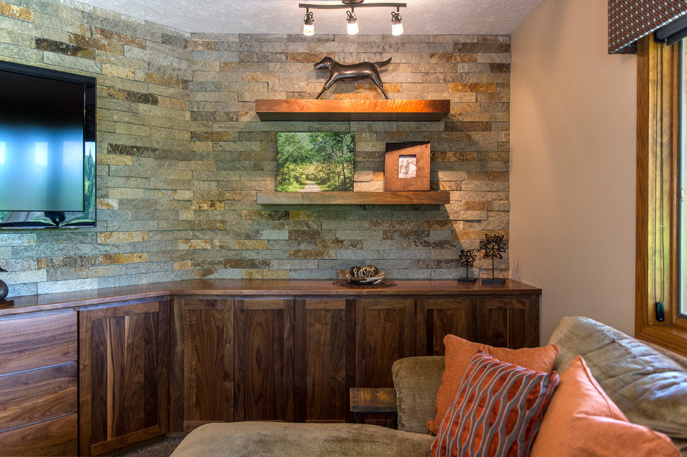 Inspiration for a mid-sized country walk-out basement in Omaha with beige walls and carpet.