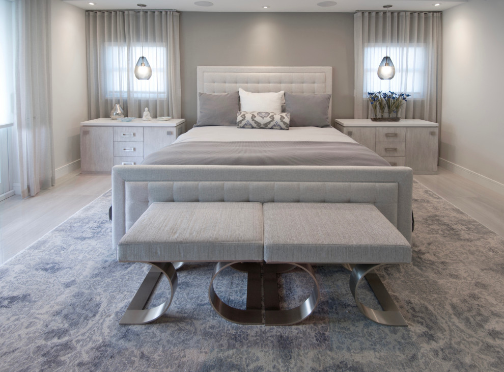 Design ideas for a large contemporary master bedroom in Miami with grey walls, porcelain floors, grey floor, recessed and wallpaper.