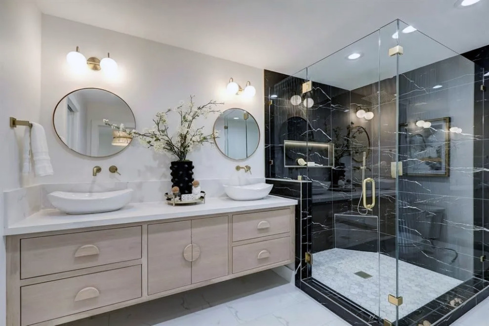 This is an example of a large ensuite bathroom in Other with beige cabinets, a freestanding bath, a corner shower, white tiles, marble tiles, white walls, marble worktops, a hinged door, white worktops, double sinks and a floating vanity unit.
