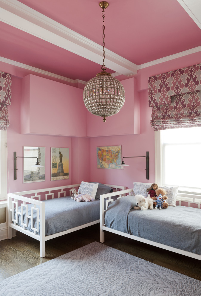 Photo of a transitional kids' room in New York with pink walls.
