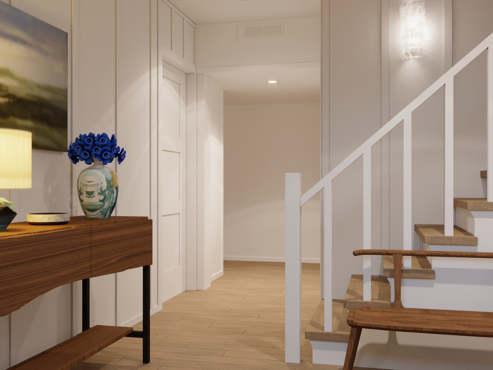 Photo of a mid-sized beach style foyer in Los Angeles with white walls, light hardwood floors, a dutch front door, a blue front door, brown floor, timber and panelled walls.
