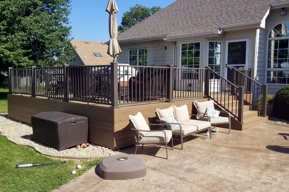 Example of a large backyard deck skirting design with no cover