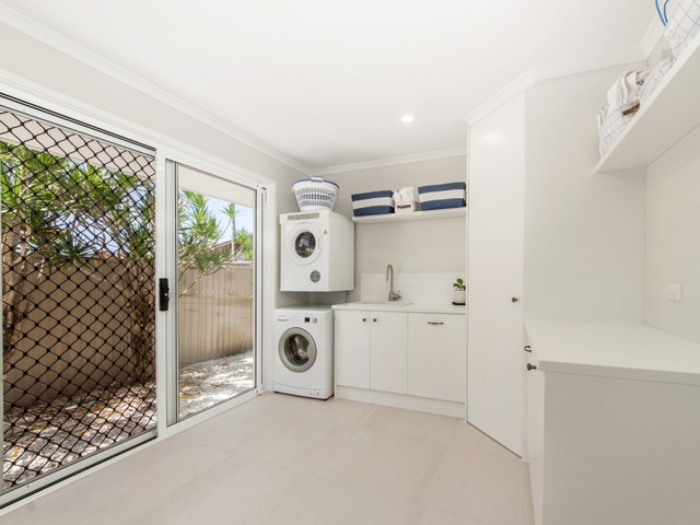 Comet Court Renovation- Built by Burleigh Constructions eclectic-utility-room