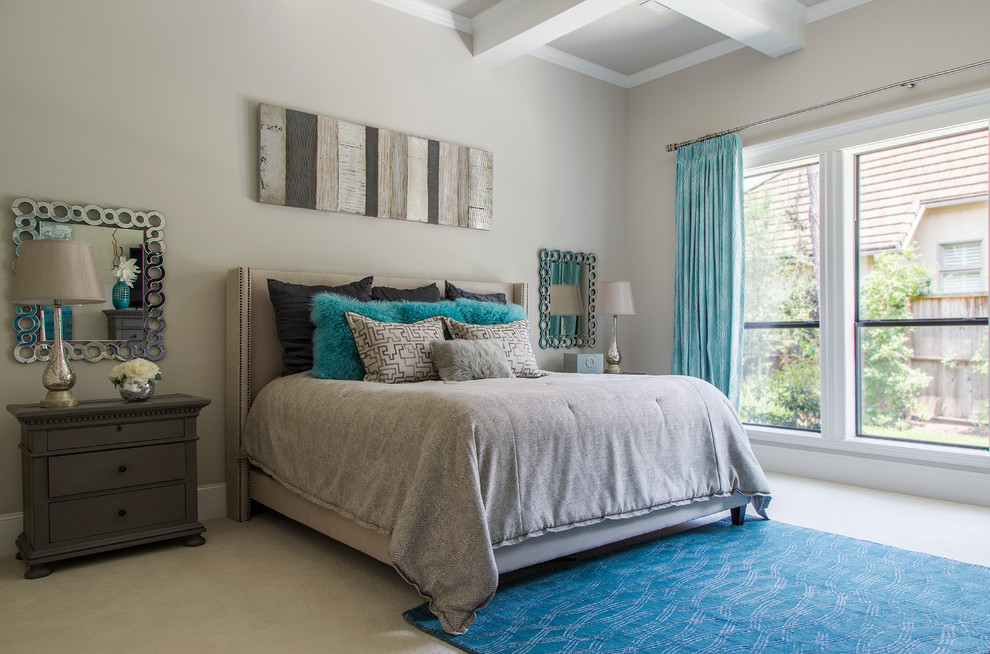Large transitional guest bedroom in Other with beige walls, carpet and beige floor.