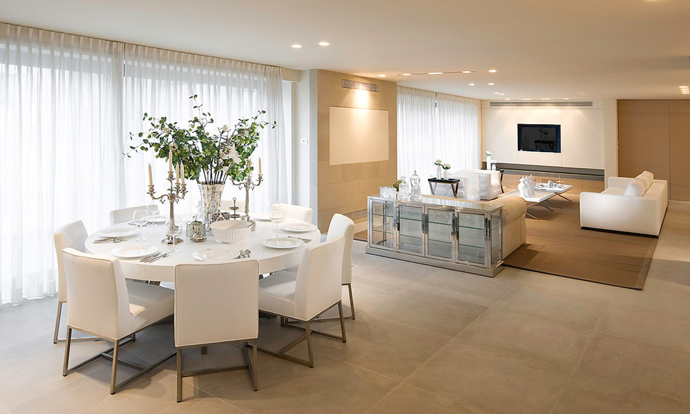 This is an example of a modern open plan dining in Other with ceramic floors.